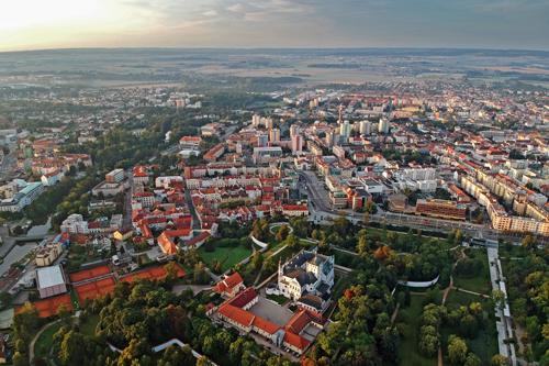 An aerial view of Pardubice showing the city skyline and the Labe (Elbe) River.