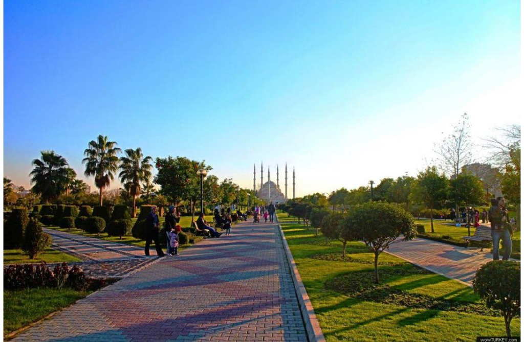 Lush greenery and walking paths in Merkez Park, Adana