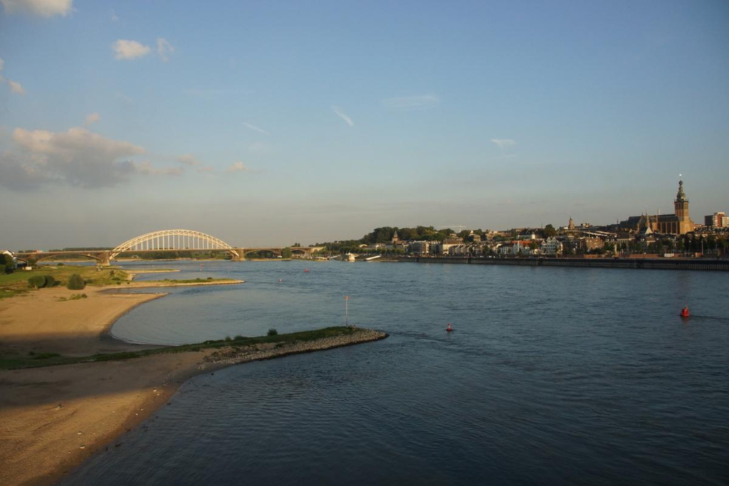 View of the Waal River flowing through Nijmegen, Netherlands.