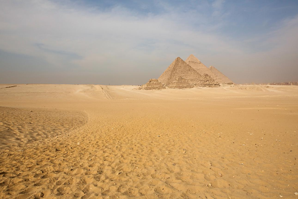 Giza Pyramids in Egypt desert landscape.