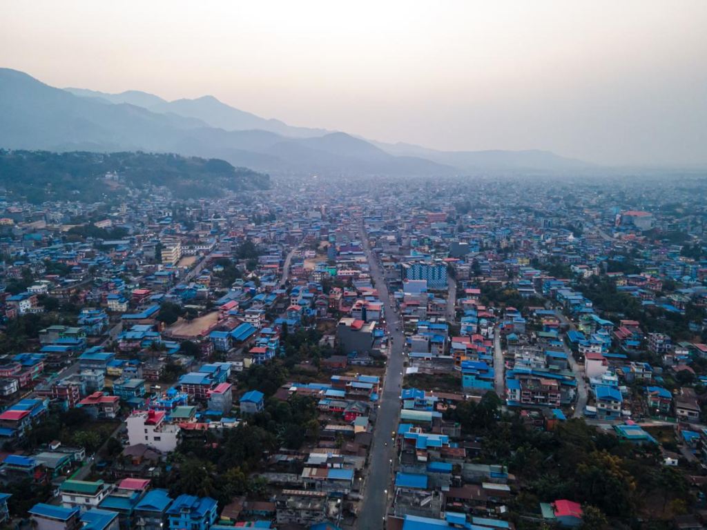A panoramic aerial view of Dharan showing the cityscape with surrounding hills and landscapes in Sunsari District, Nepal.