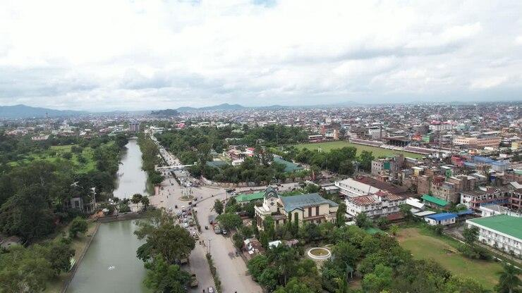 A panoramic aerial view of Biratnagar showing the cityscape, industrial zones, and surrounding rivers in Nepal.