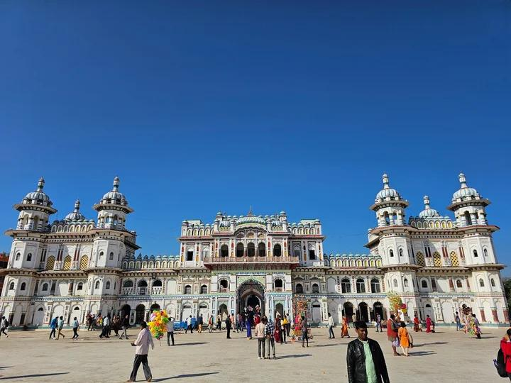 Visitors exploring Janaki Mandir, a historic Hindu temple in Janakpur, Nepal.