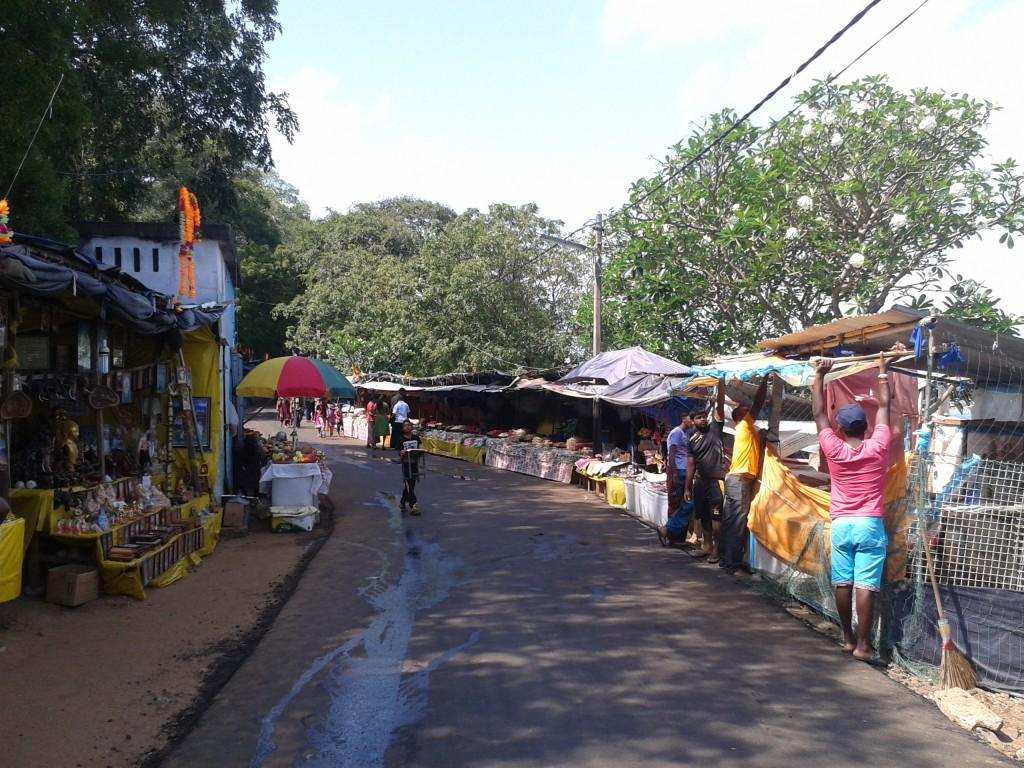 Visitors walking through streets in Trincomalee with local markets, shops, and pedestrian activity