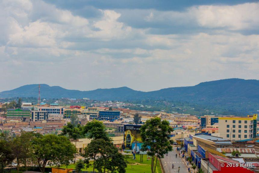 A panoramic aerial view of Muhanga showing the cityscape, surrounding hills, and green landscapes in Southern Province, Rwanda.