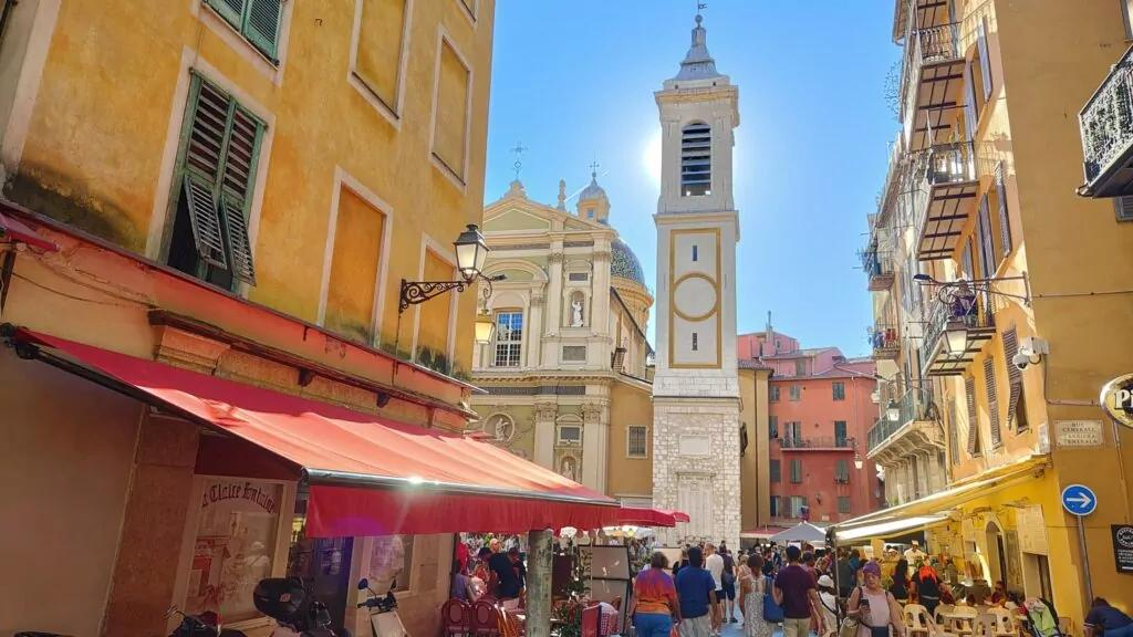 Colorful buildings and narrow streets of Old Town in Nice, France.