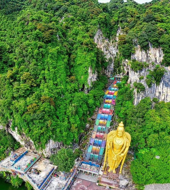 Batu Caves and the golden Lord Murugan statue near Selayang, Malaysia.