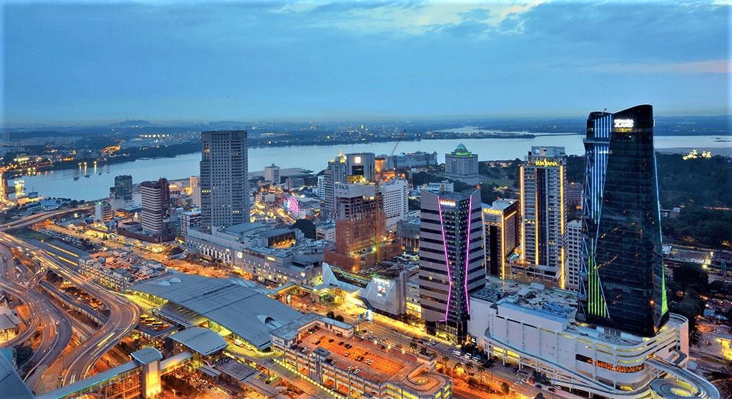 Modern skyline of Johor Bahru, Malaysia, overlooking the Johor Strait.