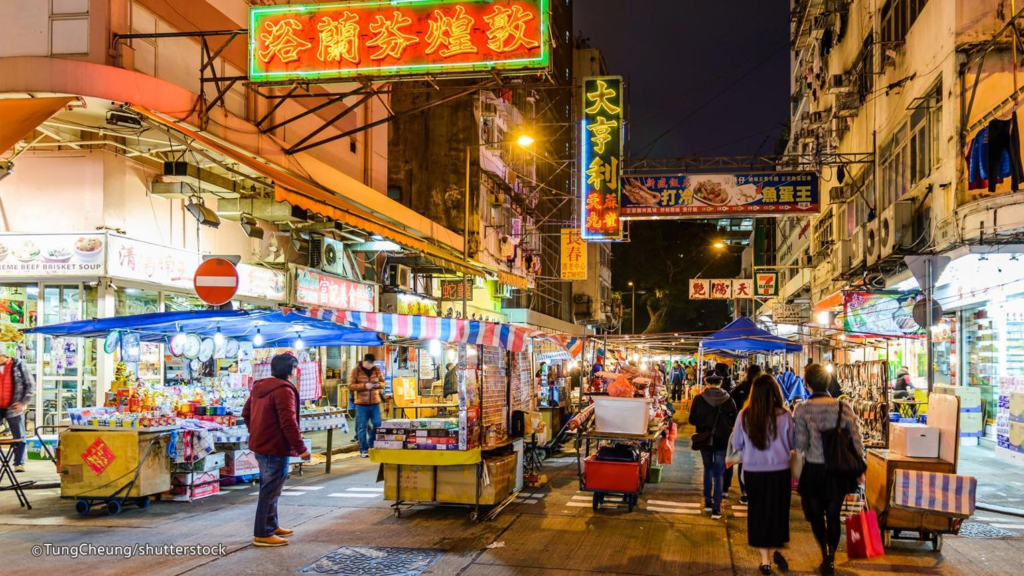 Temple Street Night Market in Yau Ma Tei, Hong Kong, filled with food stalls and shops