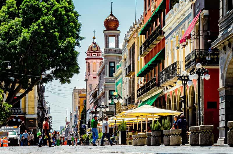 Colourful buildings, historic streets, and traditional city views.