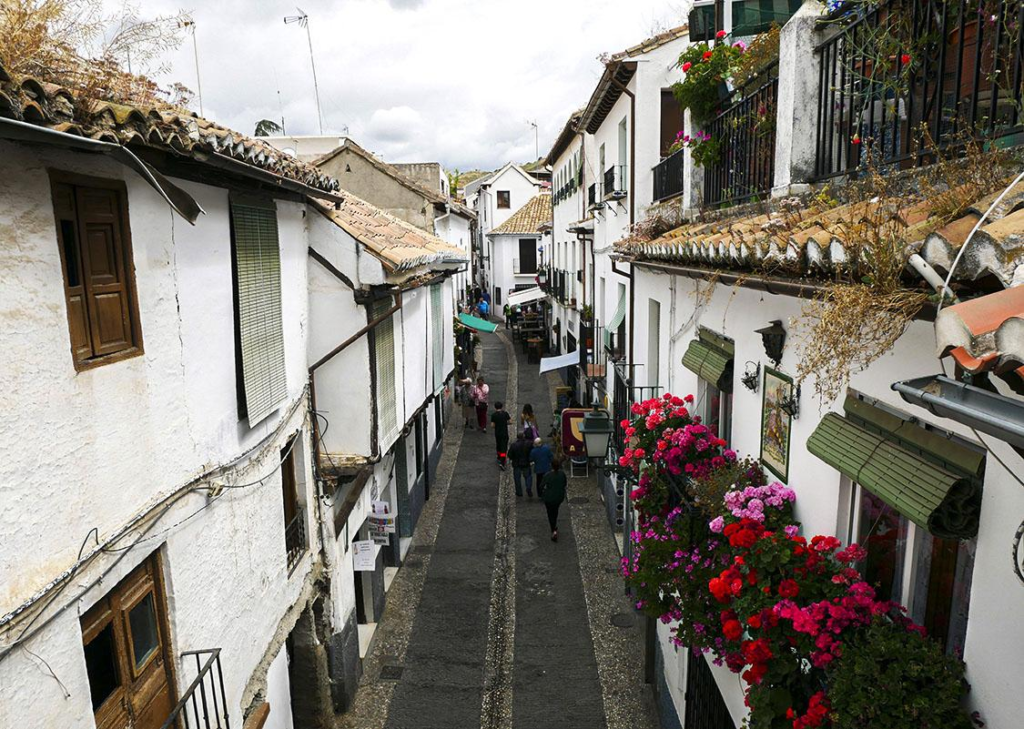 Historic streets and white buildings in Albaicin Granada Spain.
