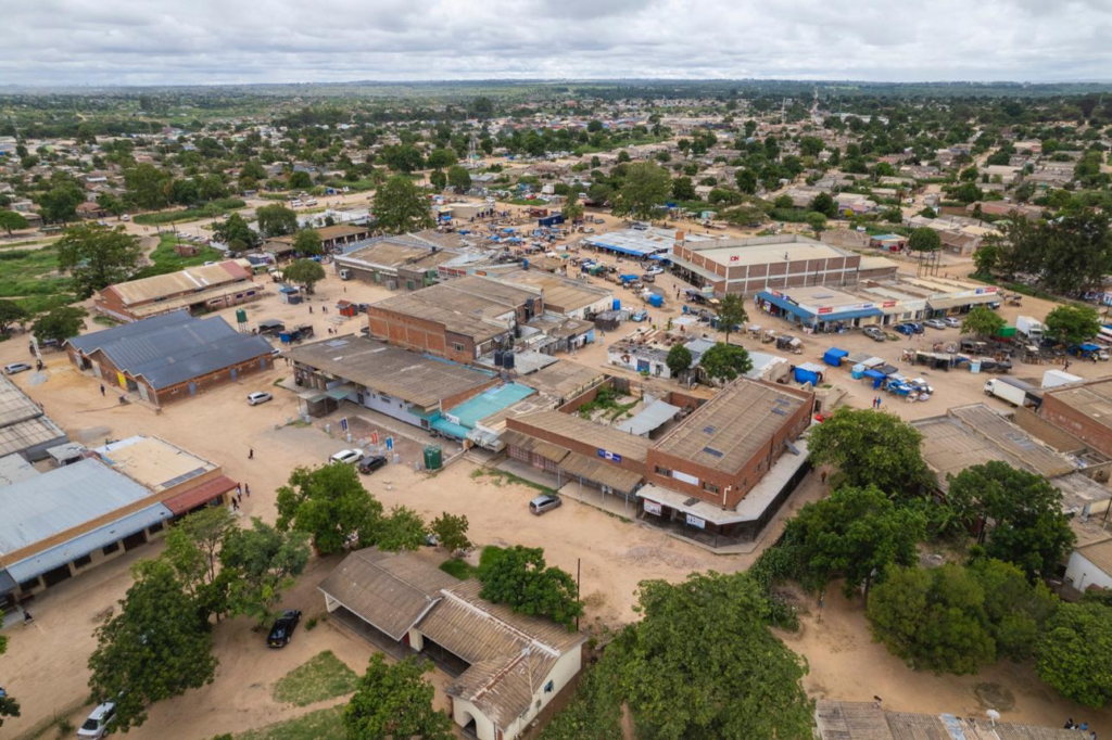 A panoramic aerial view of Chitungwiza showing the urban landscape, residential areas, and surrounding greenery in Zimbabwe.