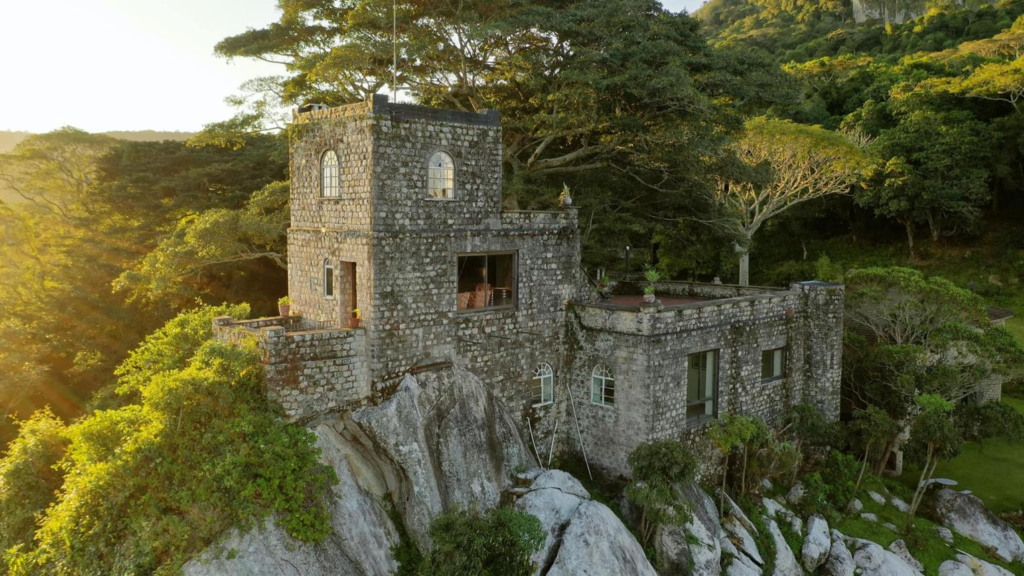 Visitors at Leopard Rock Hotel near Mutare, Zimbabwe, with scenic views of the Eastern Highlands.