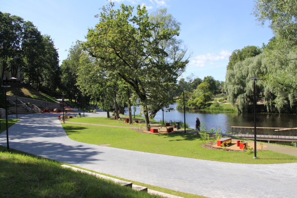 A panoramic view of Valmiera with surrounding greenery and urban neighborhoods.