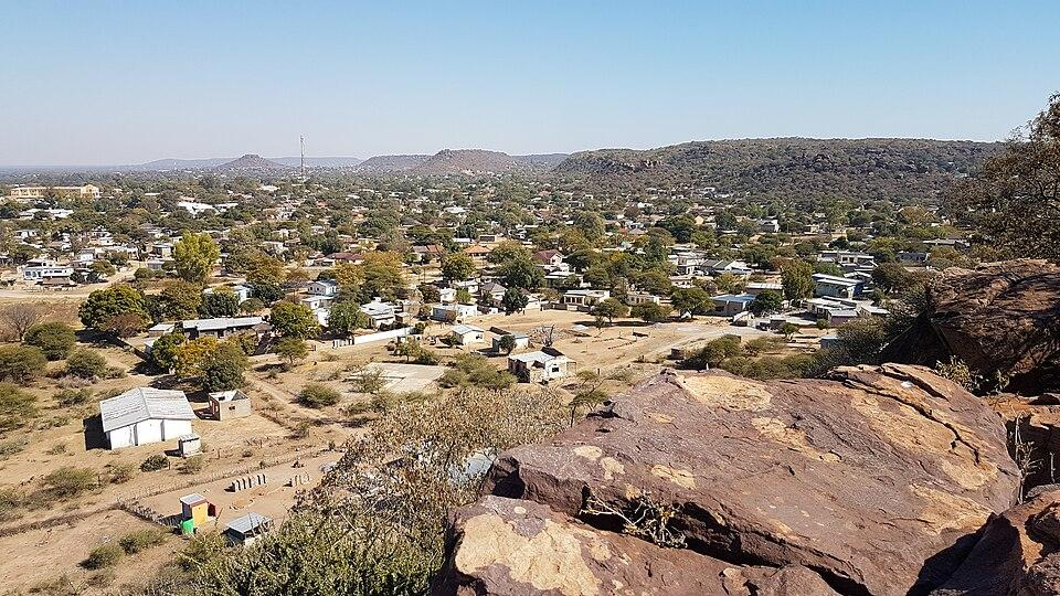 A panoramic aerial view of Mochudi showing the town, surrounding countryside, and Kgatleng District landscape in Botswana.