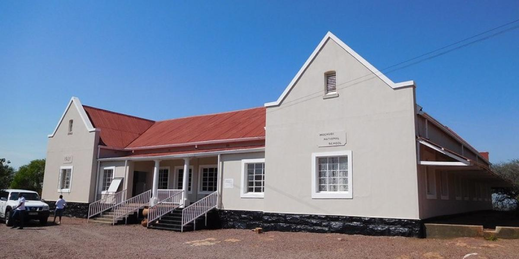 Visitors exploring Phuthadikobo Museum in Mochudi, Botswana, showcasing local culture and heritage exhibits.