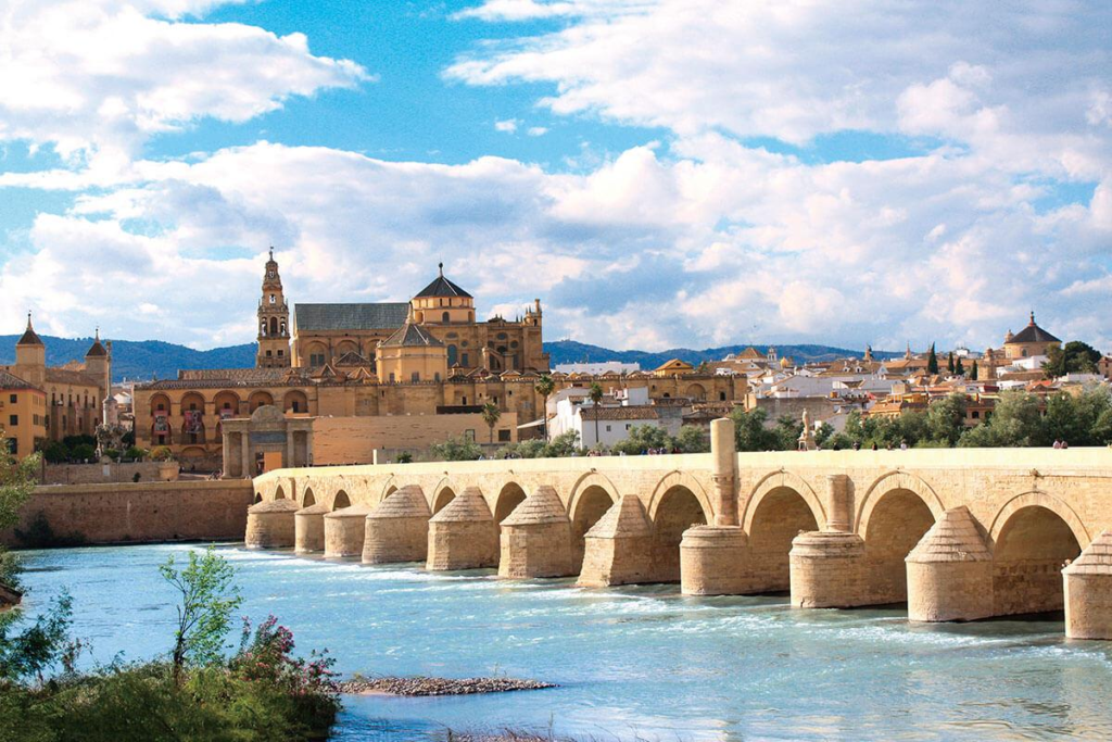 The Roman Bridge over the Guadalquivir River in Córdoba, Spain, representing the city’s historical and cultural identity.