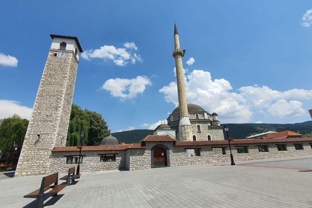 Visitors exploring the Husein-paša Mosque in Pljevlja, Montenegro, a historic Ottoman-era landmark.