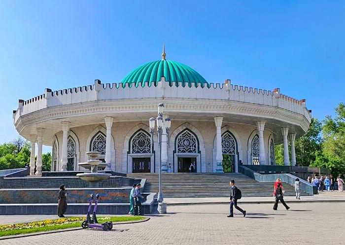 Visitors exploring the Amir Timur Museum in Tashkent, Uzbekistan, a cultural and historical landmark.