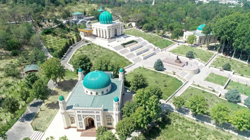 Visitors enjoying Babur Park in Andijan, Uzbekistan, a historic and recreational landmark