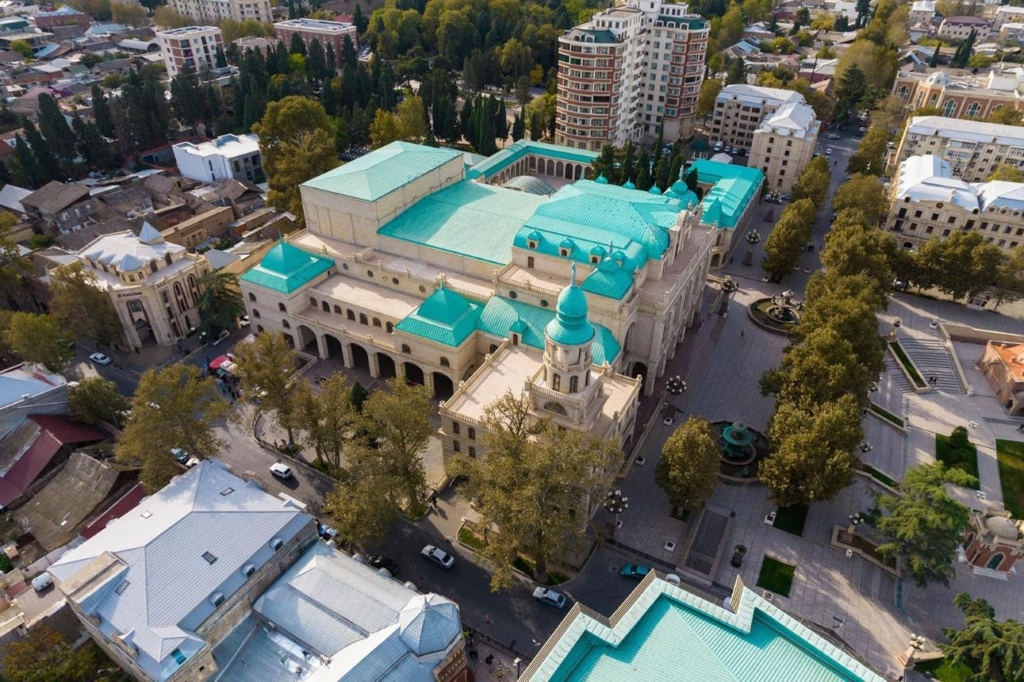 A panoramic aerial view of Ganja showing the cityscape and Nizami Mausoleum in Azerbaijan.