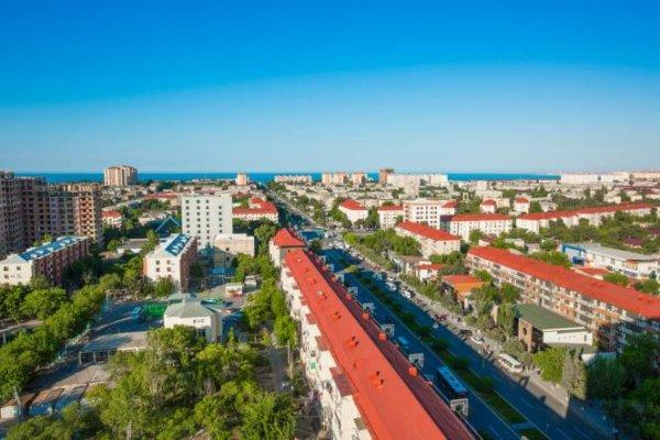 A panoramic aerial view of Sumqayit showing the cityscape along the Caspian Sea coastline in Azerbaijan.