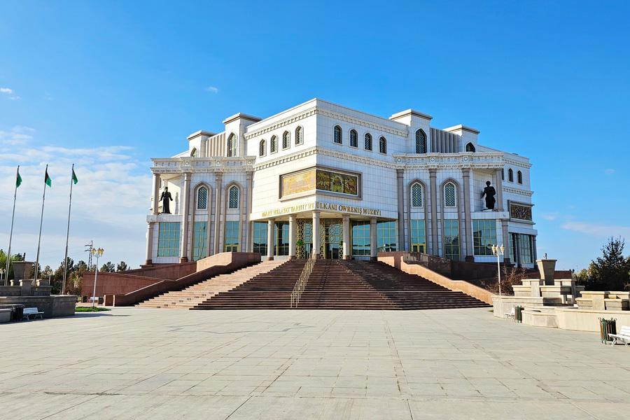 Visitors exploring the Mary Museum in Turkmenistan, a historic and cultural landmark.