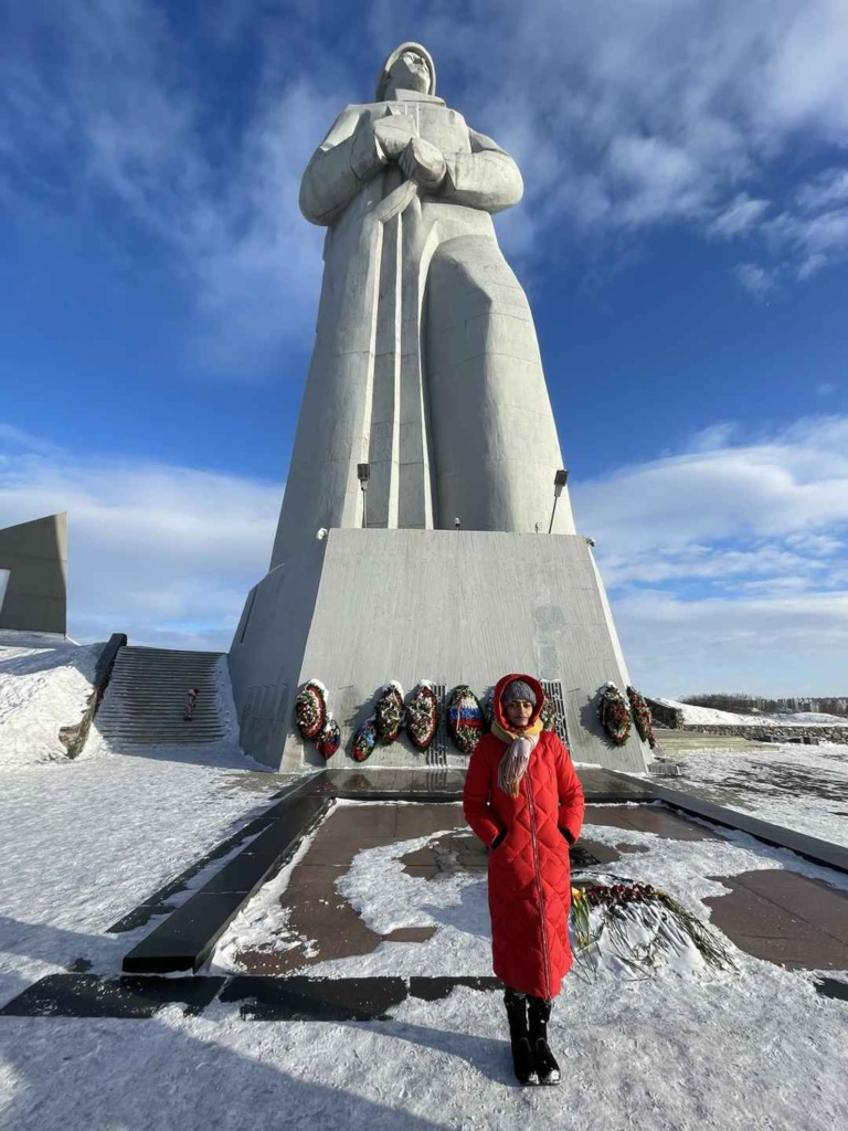 Visitors exploring the Alyosha Monument in Murmansk, Russia, a landmark honoring World War II soldiers.