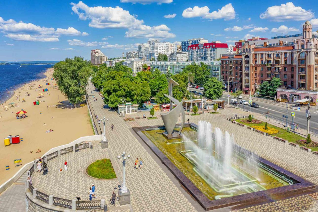 Visitors enjoying the Samara Embankment along the Volga River in Russia, a recreational and tourist area.