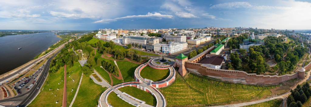A panoramic aerial view of Nizhny Novgorod showing the cityscape at the confluence of the Volga and Oka rivers in Russia.