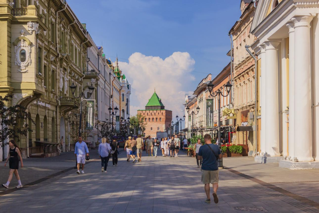 Visitors exploring the Nizhny Novgorod Kremlin in Russia, a historic fortress and cultural landmark.