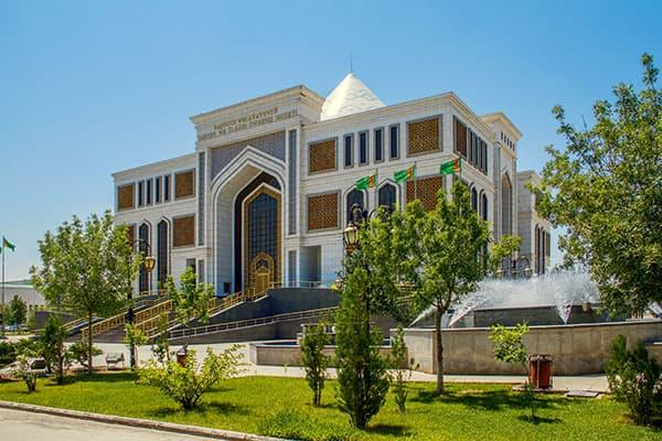 Visitors exploring the Dashoguz Museum in Turkmenistan, a cultural and historical landmark.