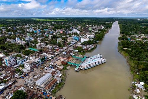 An aerial view of Barishal showing the city skyline along the Kirtankhola River.