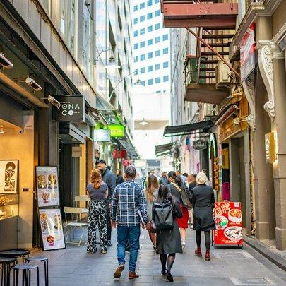 Tourists walking through Melbourne's famous laneways