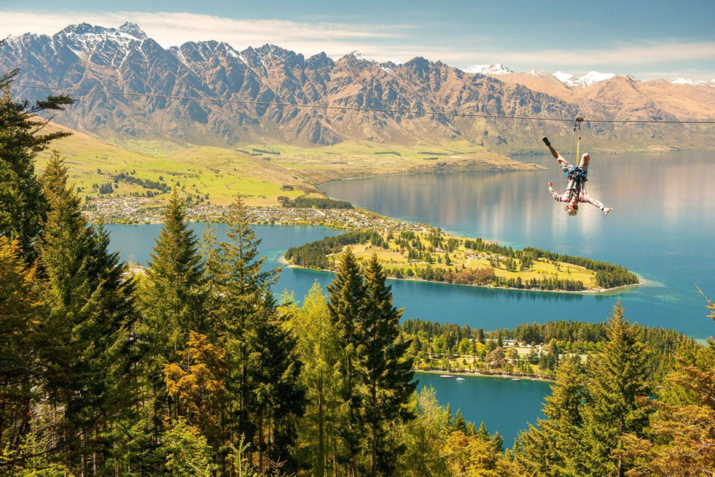 Adventure sports in Queenstown, New Zealand, including skiing and bungee jumping.
