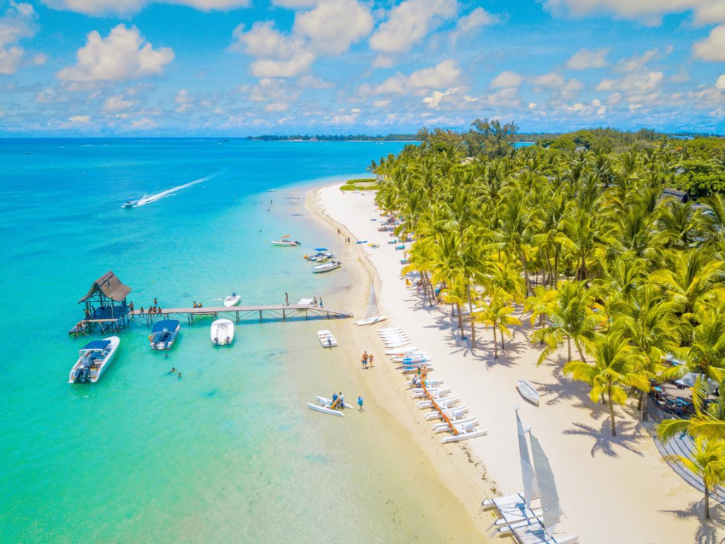 White sandy beach and turquoise waters at Trou aux Biches, Mauritius.