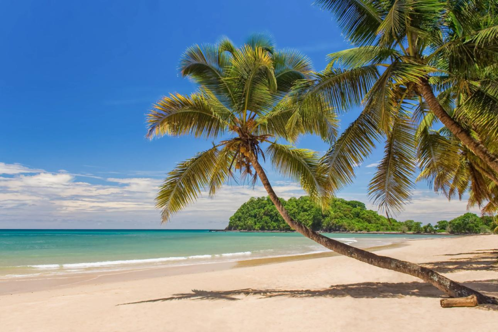 White sandy beach with turquoise water on Nosy Be Island, Madagascar.