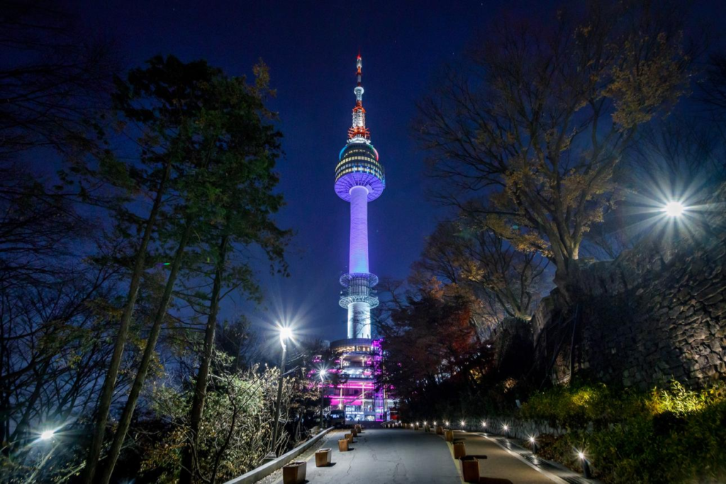 N Seoul Tower overlooking Seoul skyline at night
