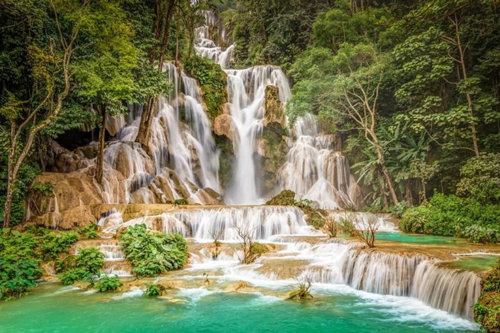 Turquoise pools and waterfalls at Kuang Si Falls in Laos.